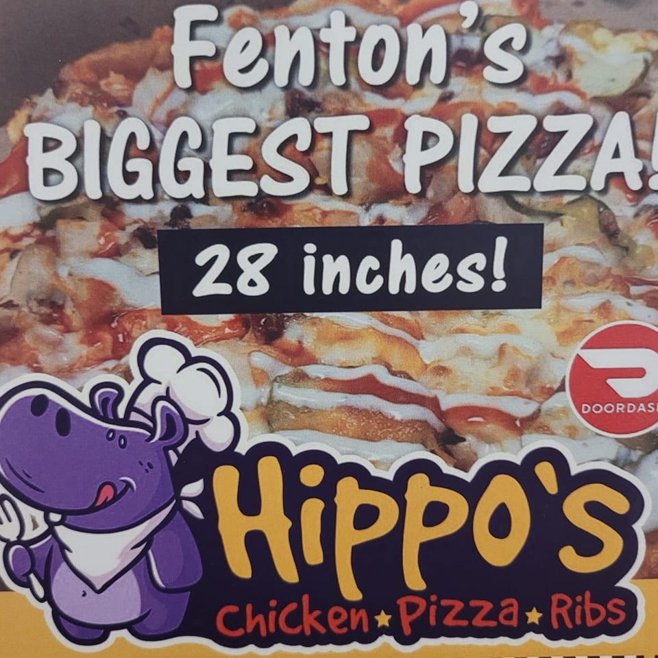 Hippo's Chicken, Pizza, Ribs & Fish advertisement for Fenton's Biggest 28-inch pizza, featuring a cartoon hippo chef.